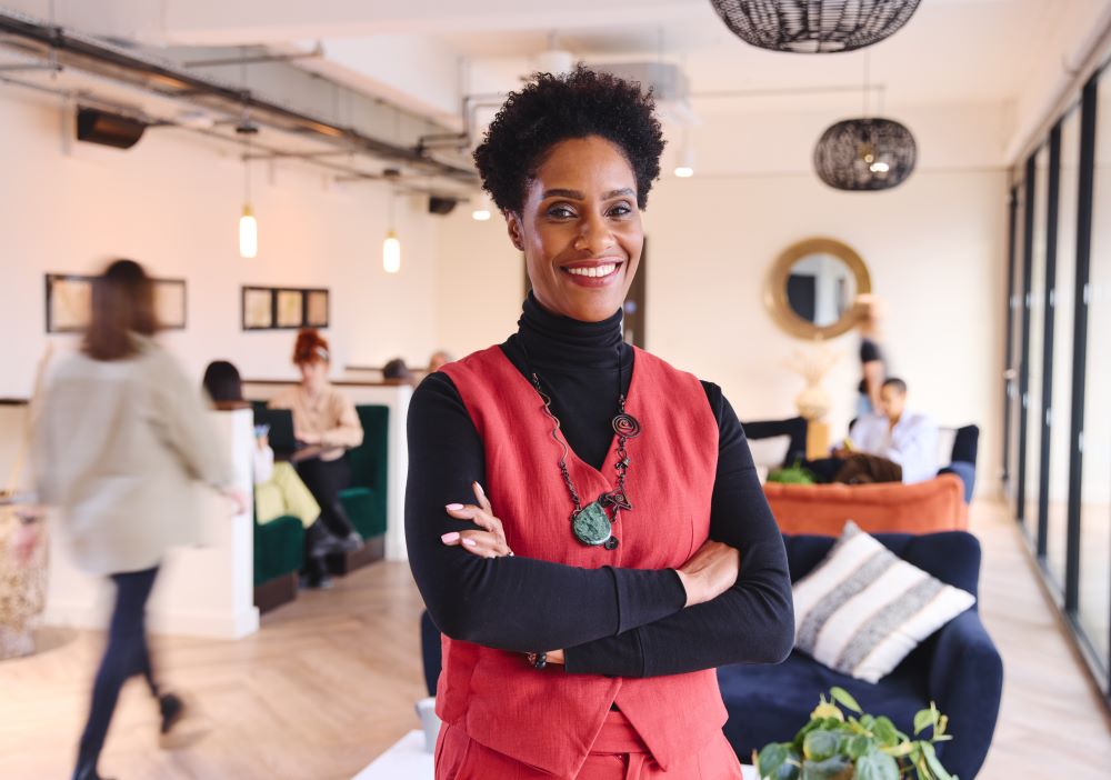 Female business owner smiling in the camera