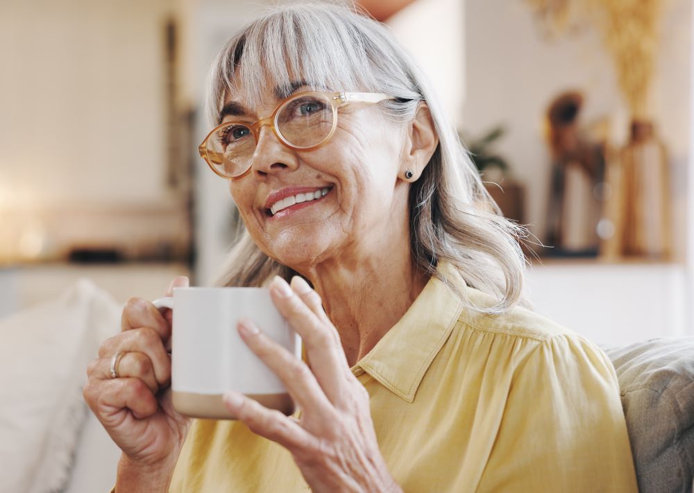 Woman smiling having a tea